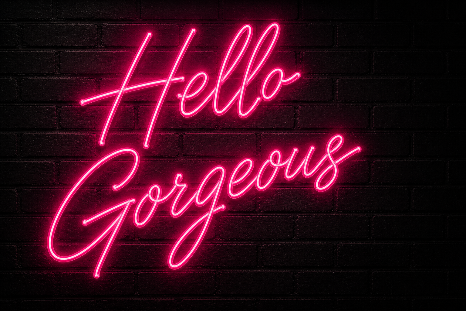 Hot pink neon sign reading Hello Gorgeous on black brick